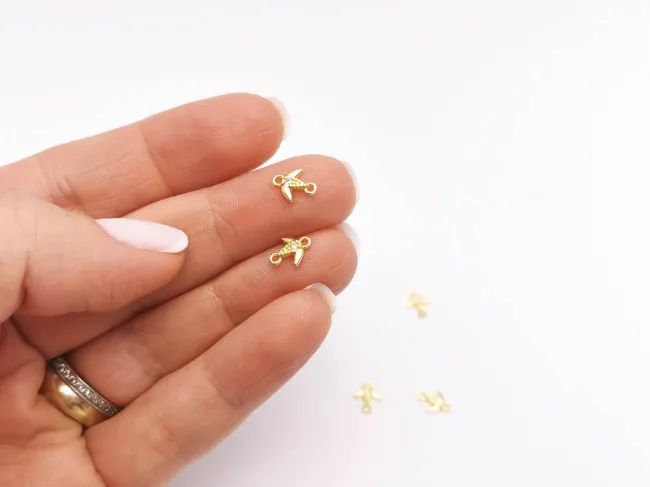 Link cubic zirconia auriu randunica 8x6.5x1.5mm roz