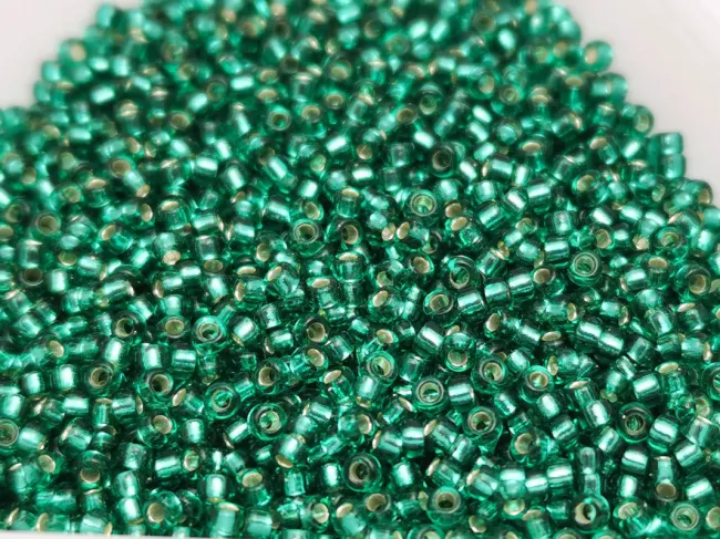Miyuki Rocailles Rotunde 15/0 Silver Lined Flame Emerald (10g)