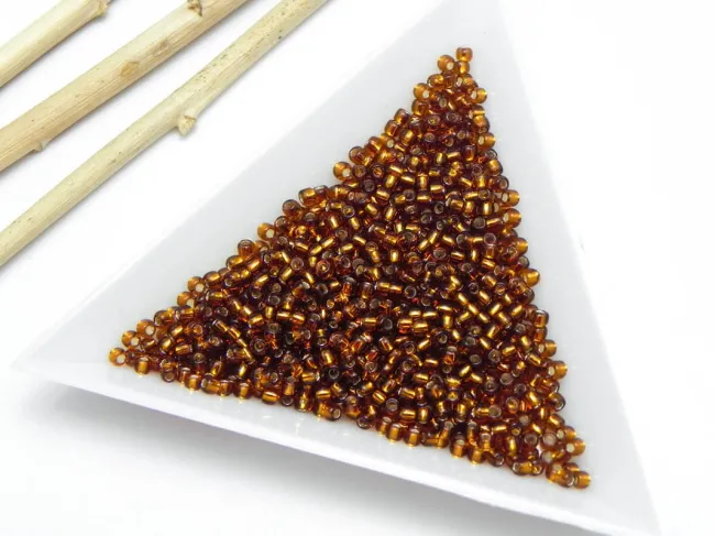 Toho rotunde 11/0 silver lined smokey topaz (5g)