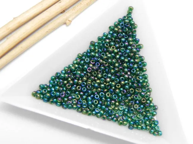 Toho rotunde 11/0 transparent rainbow green emerald (5g)